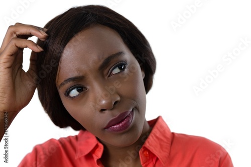 Canvas Print Close up of confused young woman