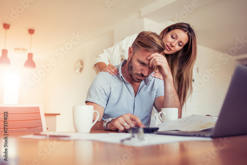 Couple having problem with bills photo