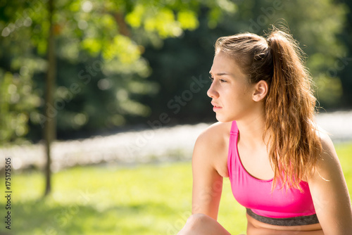 Portrait of young fit woman outdoors
