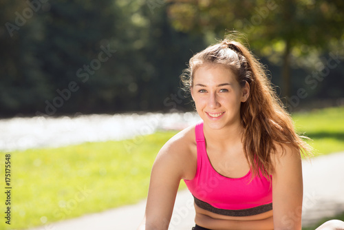 Portrait of young fit woman outdoors