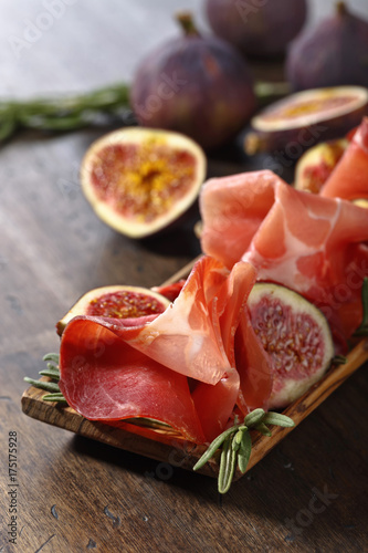 Prosciutto with figs and rosemary.