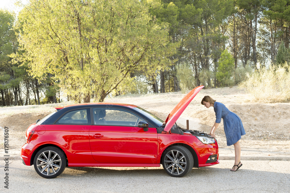 desperate and confused woman stranded on roadside with broken car engine failure or crash accident desperate and confused woman stranded on roadside with broken car engine failure or crash accident