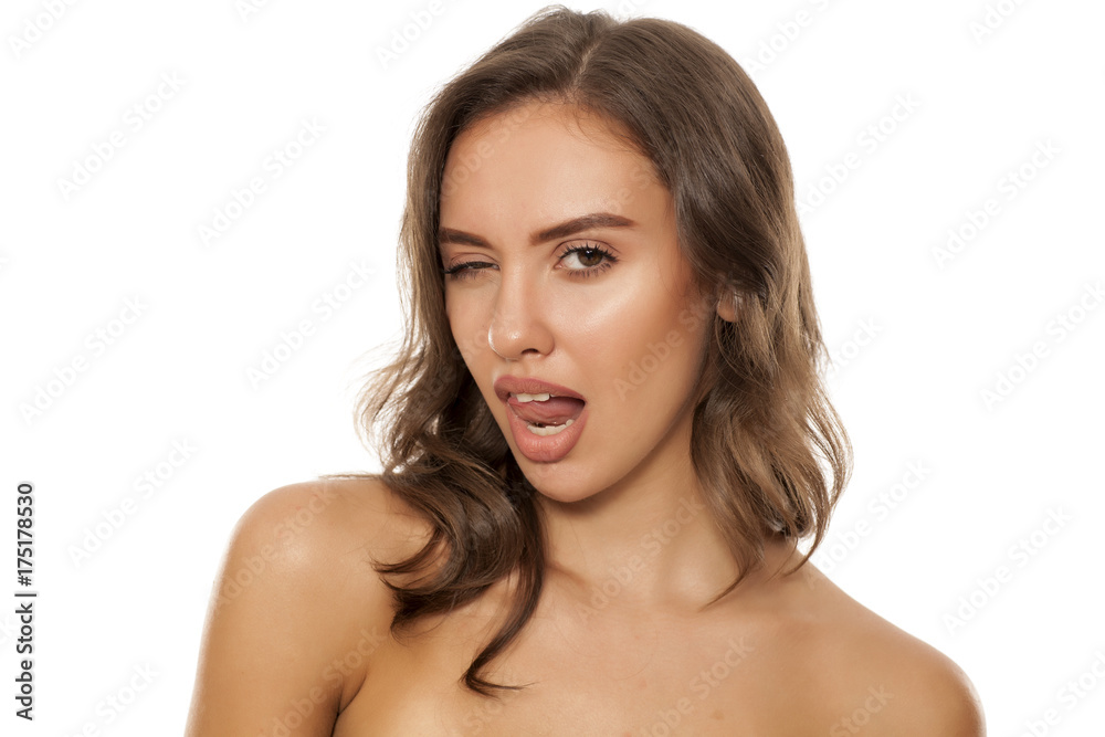 Portrait of beautiful young seductive woman on white background Portrait of beautiful young seductive woman on white background