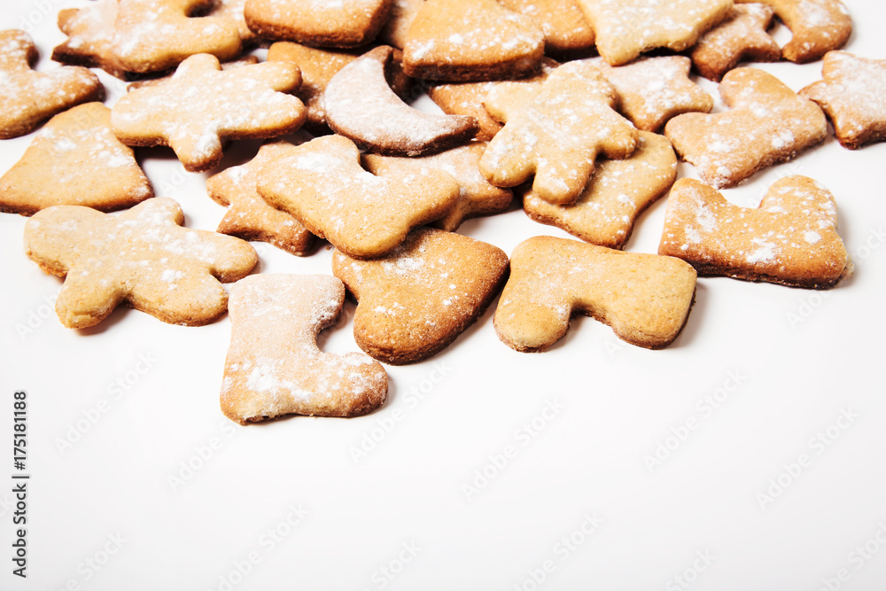 Gingerbreads on white background.Copy space.Minimalistic style. Gingerbreads on white background.Copy space.Minimalistic style.