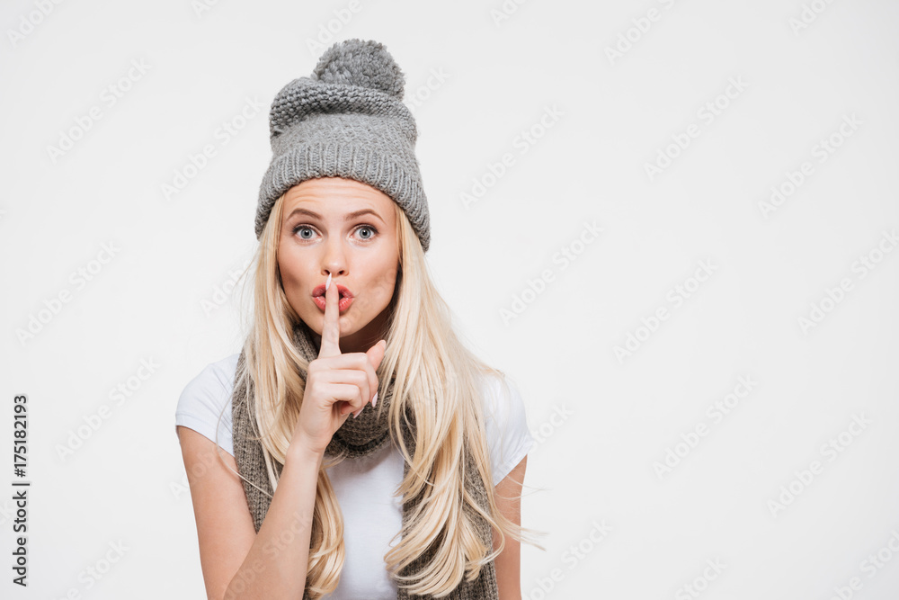 Portrait of a young woman in winter hat and scarf Portrait of a young woman in winter hat and scarf