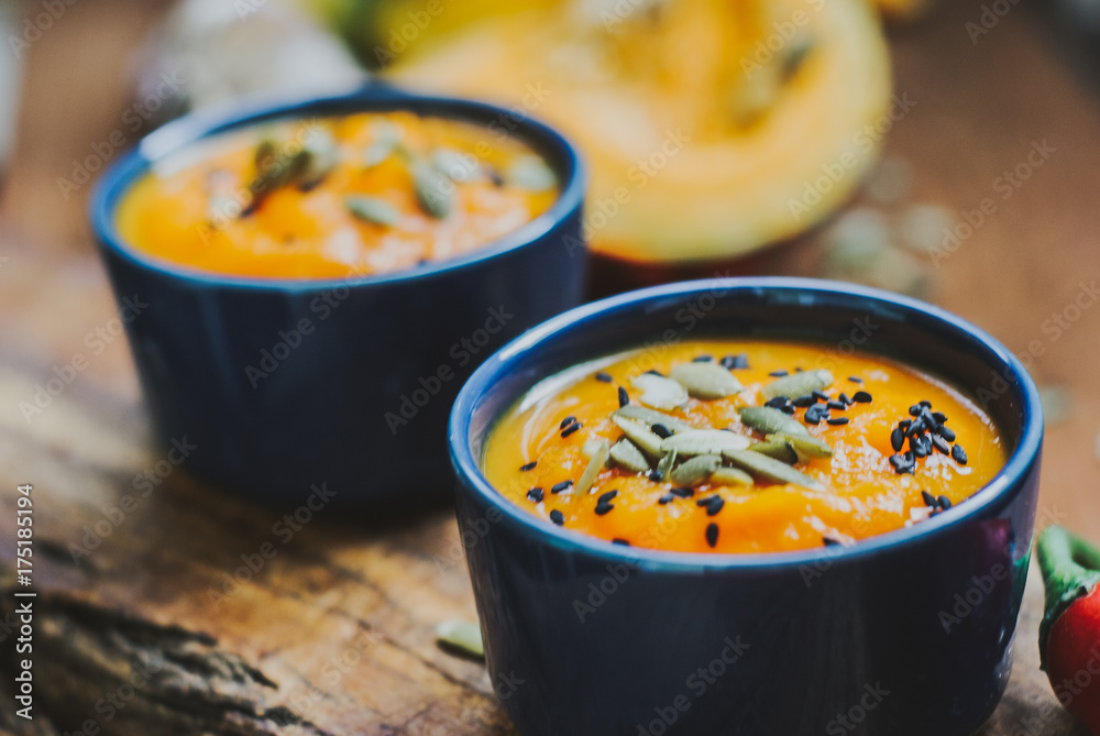 Homemade vegetable soup with pumpkin with cream and black sesame, pumpkin seeds Homemade vegetable soup with pumpkin with cream and black sesame, pumpkin seeds