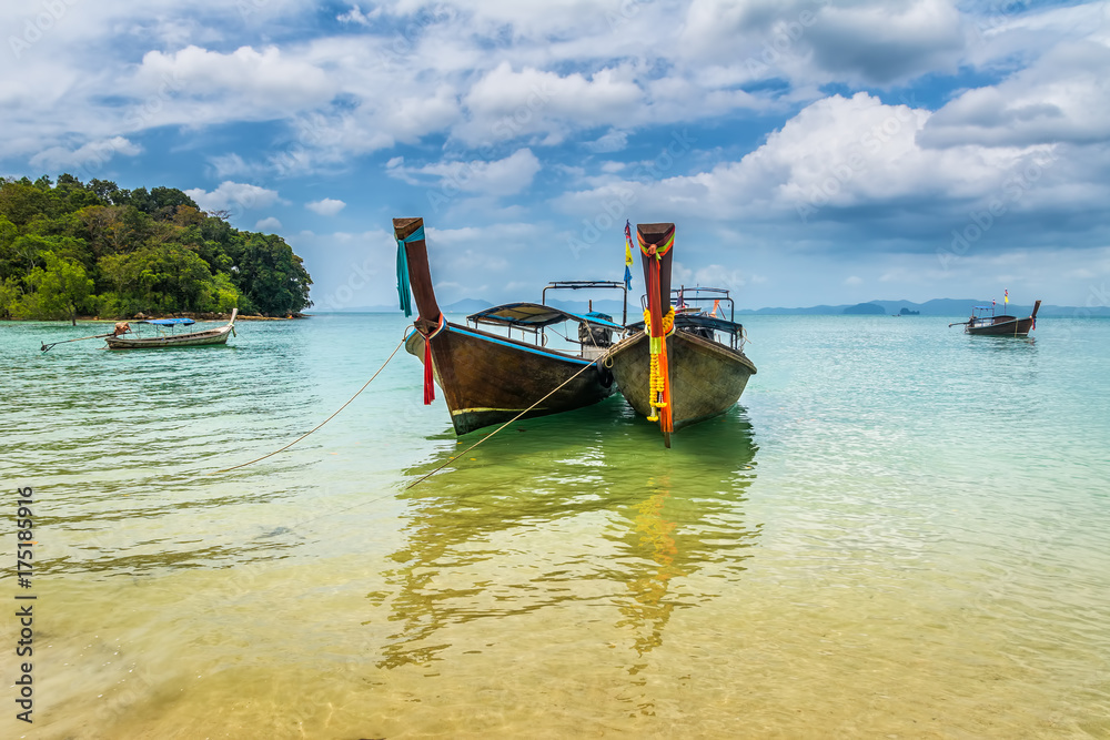 Amazing view of beautiful beach with longtale boats. Location: Krabi, Thailand, Andaman Sea. Artistic picture. Beauty world. Amazing view of beautiful beach with longtale boats. Location: Krabi, Thailand, Andaman Sea. Artistic picture. Beauty world.