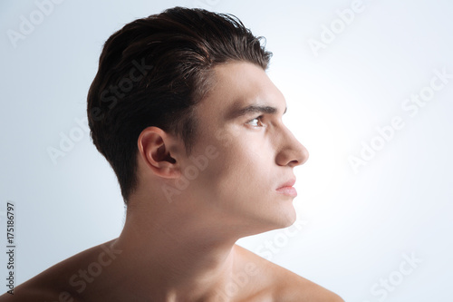 Photography Young man standing in semi position