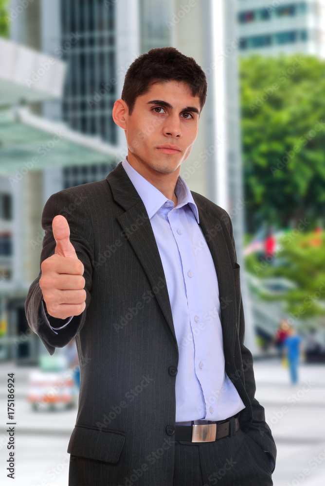 Businessman in suit over singapore city Businessman in suit over singapore city