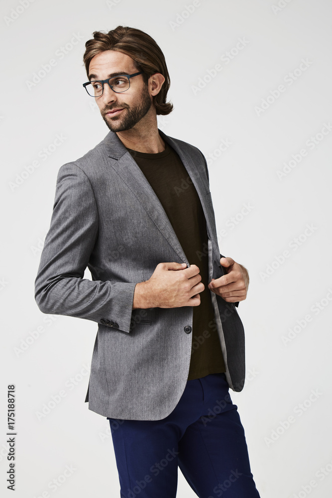 Smart dude in grey suit jacket, looking away Smart dude in grey suit jacket, looking away