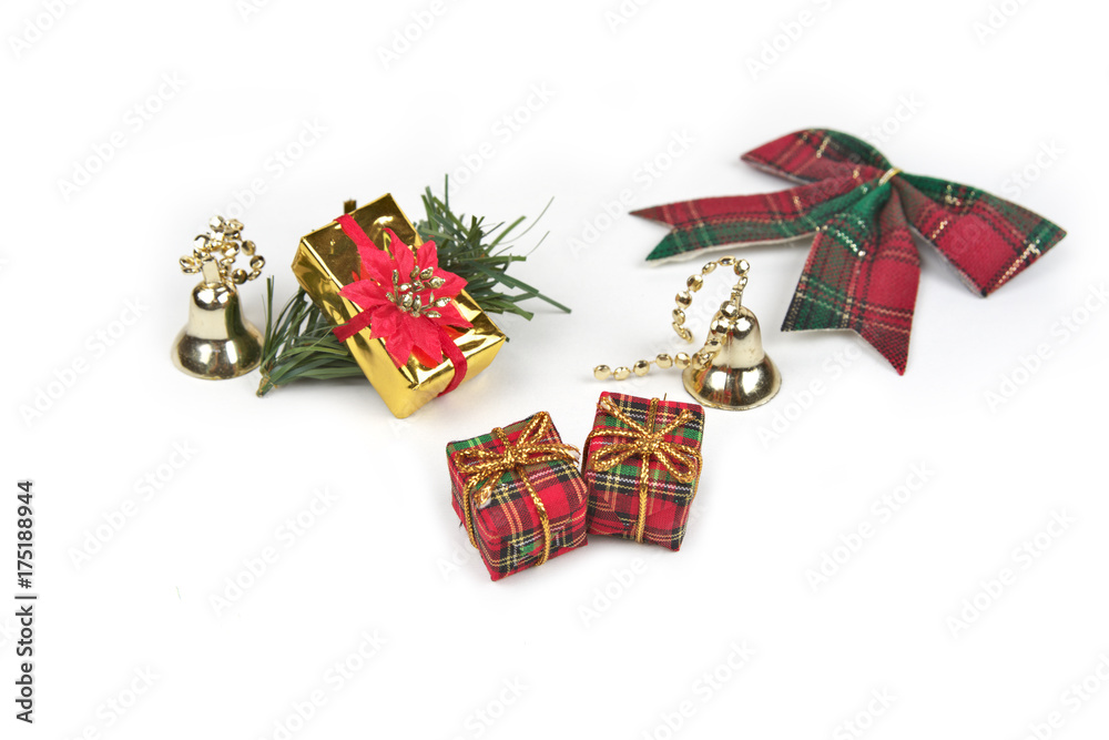 Christmas background with decorations  holly and present boxes, ribbon on white