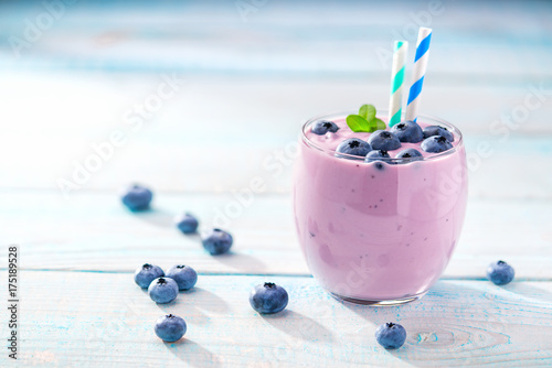 One serving of homemade smoothie  with fresh  blueberry