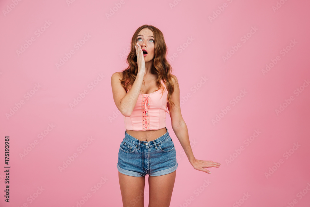 Portrait of a shocked surprised woman in summer clothes Portrait of a shocked surprised woman in summer clothes
