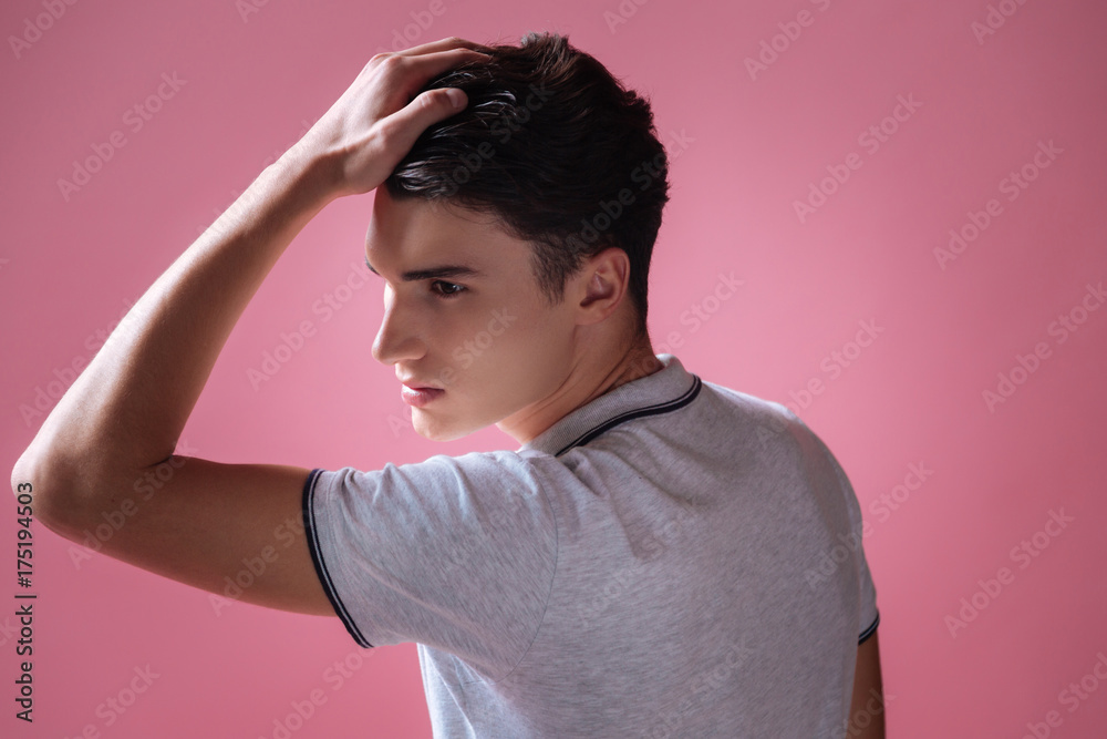 Emotional male model standing in semi position Emotional male model standing in semi position