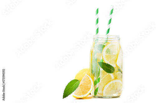 lemon juice bottle glass with fruits isolated