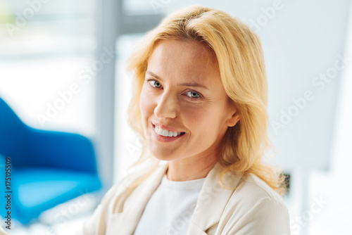 Free Download Portrait of smiling female that posing on camera - GFXLoad