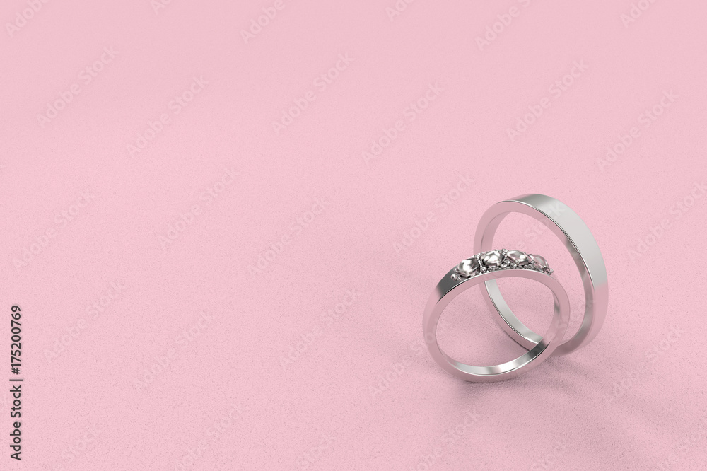 3d rendering. A pair of wedding rings on pink background 3d rendering. A pair of wedding rings on pink background