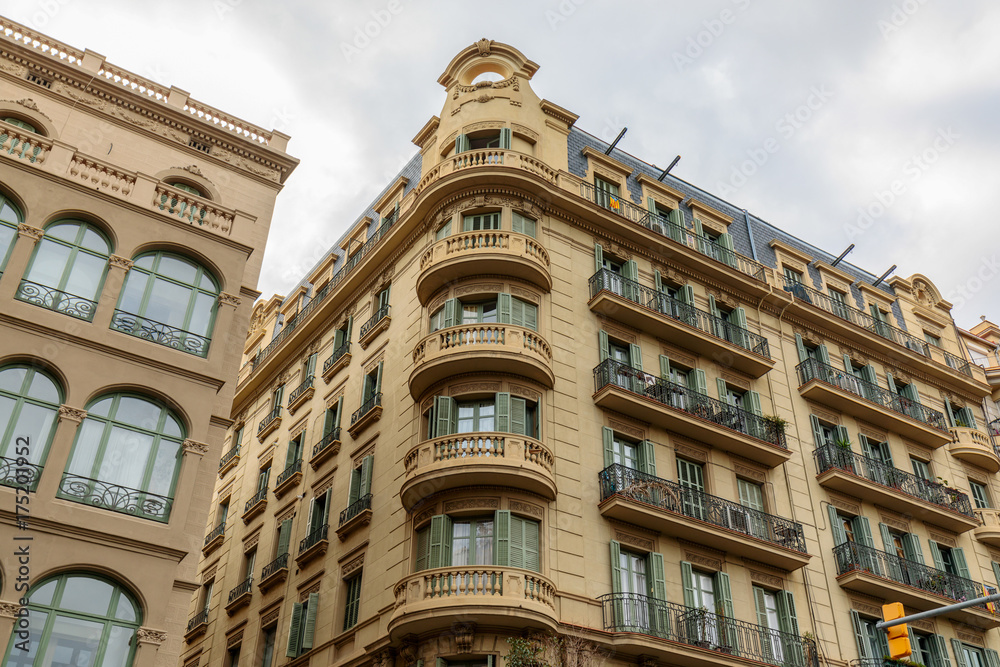 Facade of historical building in Barcelona city center, Spain