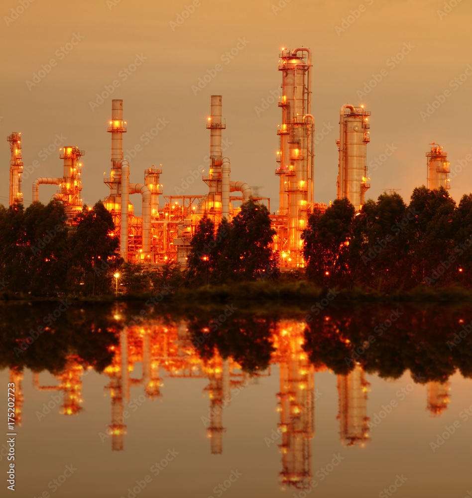 Reflection of petrochemical industry on sunset