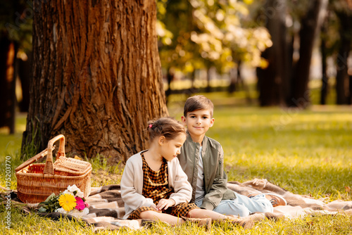 children on picnic blanket