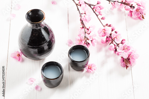 Tasty and strong sake with flowers of blooming cherry