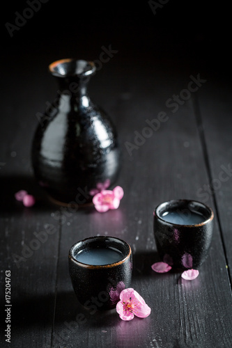 Ready to drink sake on black table