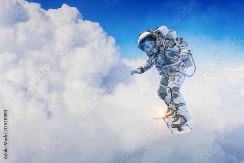 Spaceman on flying board. Mixed media