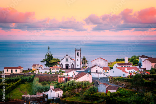 Beautiful pink stunning sunrise in a village in Nordeste, Sao Miguel Island, Azores, Portugal photo