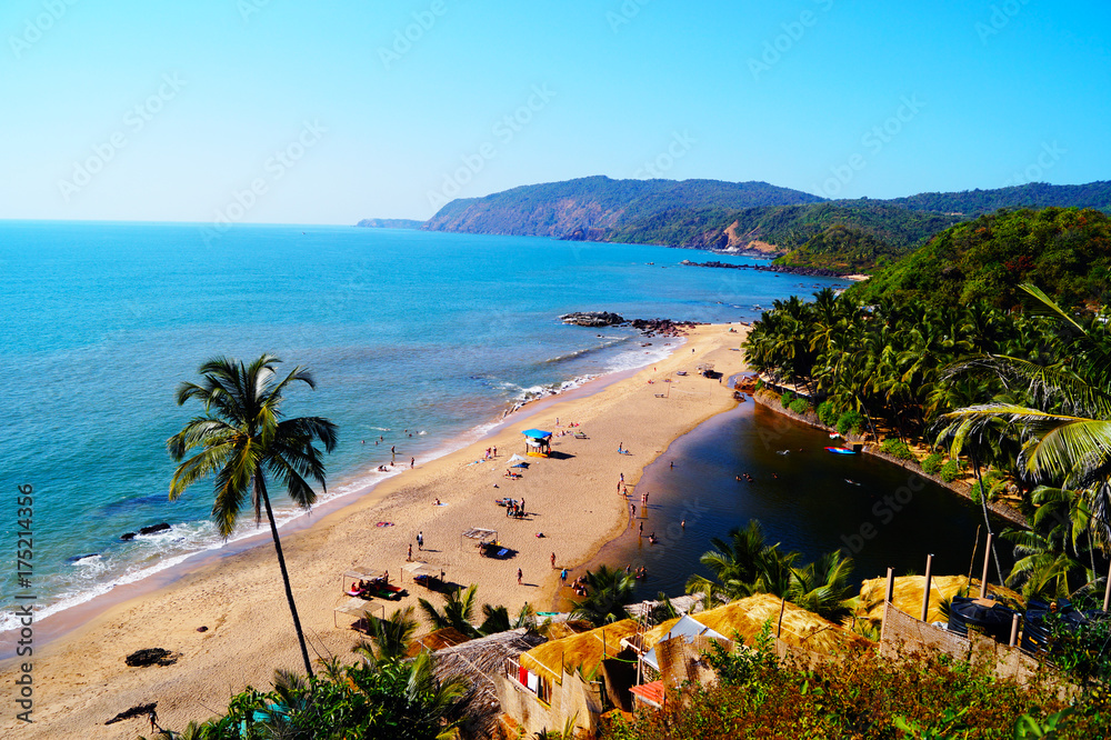 One of the best beaches in Goa - Cola beach. Quiet place for relax and spend holidays. Beach huts on the coast. Luxury holidays. - obrazy, fototapety, plakaty 