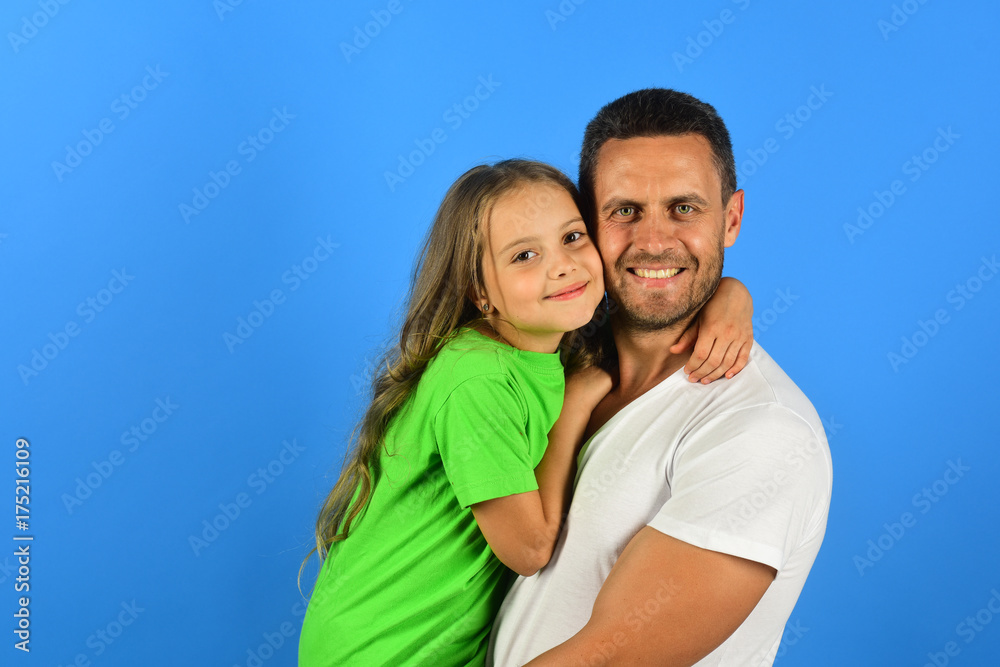 Girl and man with happy faces isolated on blue background Girl and man with happy faces isolated on blue background
