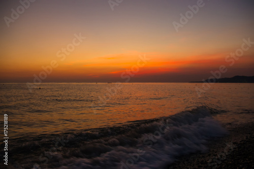 Amazing sea sunset, the sun, waves, clouds