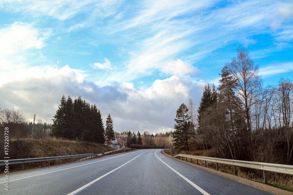 Naklejka premium Road europe trip winter fall. Latvia roads