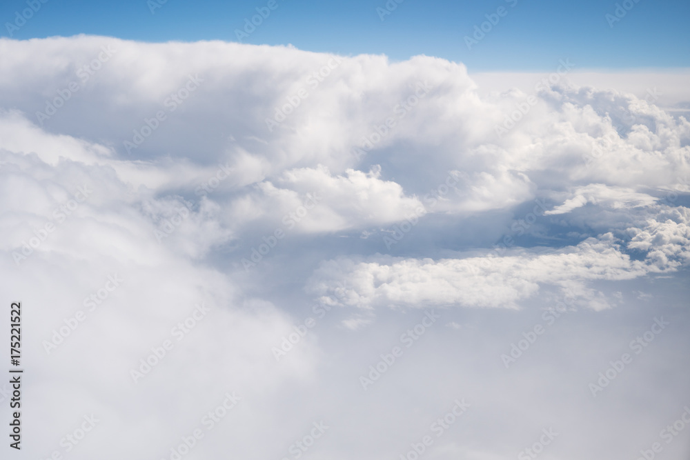Fototapeta premium blue sky with the clouds from the plane view