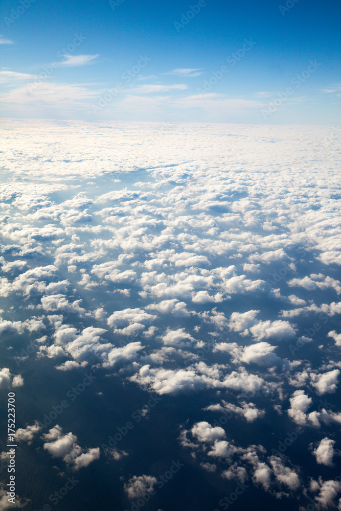 A view of the earth with clouds and the surface of the stratosphere