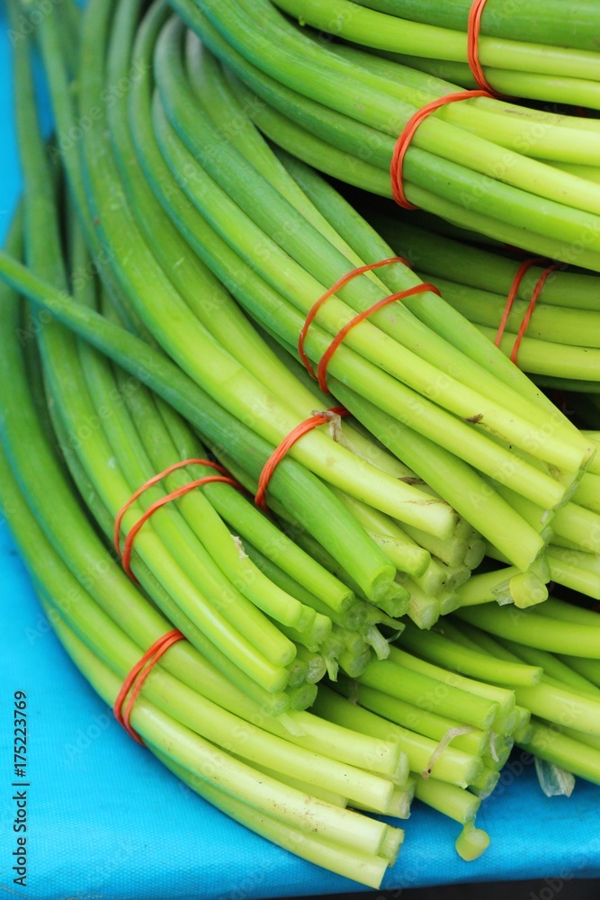 Onion flower stem for cooking in market Onion flower stem for cooking in market
