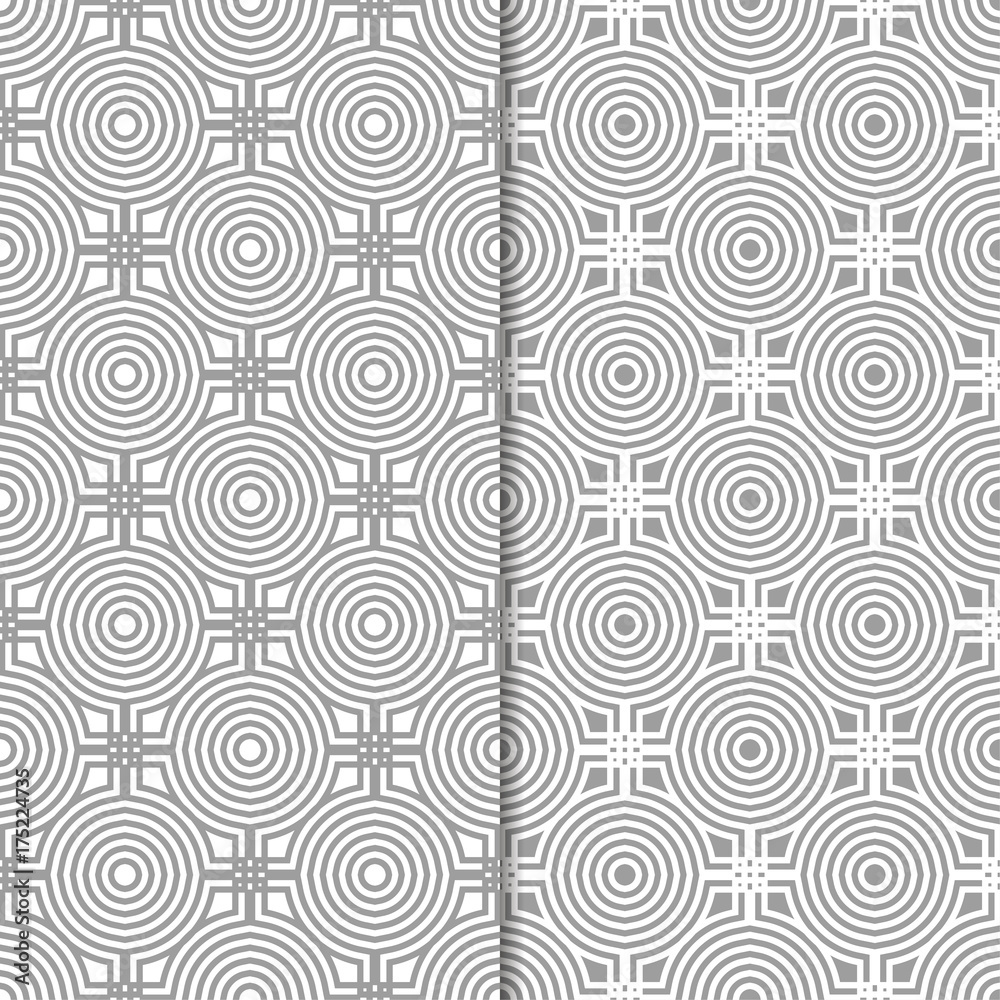 Set of geometric ornaments. Gray and white seamless patterns