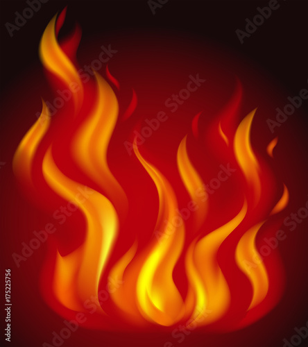 Red flames burning on dark background
