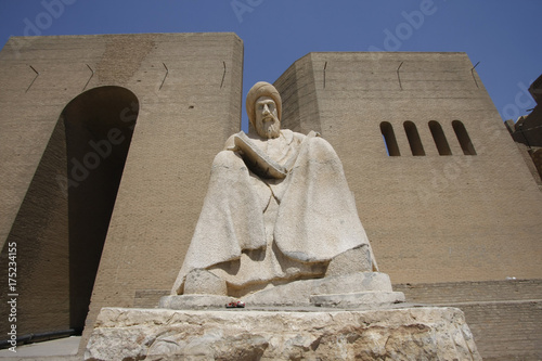 Monument to Ibn al-Mustawfi in front of Erbil Citadel photo
