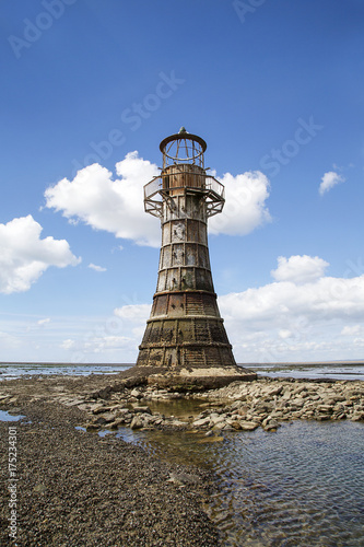 Whiteford Lighthouse is listed by Cadw as Grade II* A wave-swept cast-iron lighthouse in British coastal waters and an important work of cast-iron engineering and nineteenth-century architecture. 