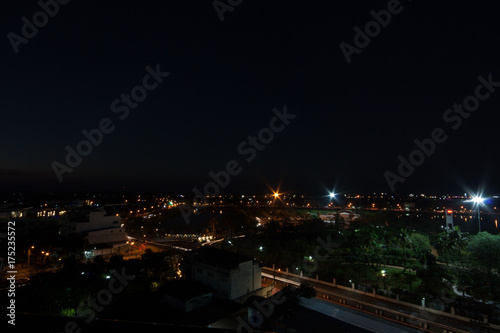 Cityscape. Night scene, glittering lights from tall buildings in the capital.