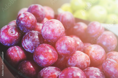 Wallpaper Mural Bowl of ripe red plums on the table. Torontodigital.ca