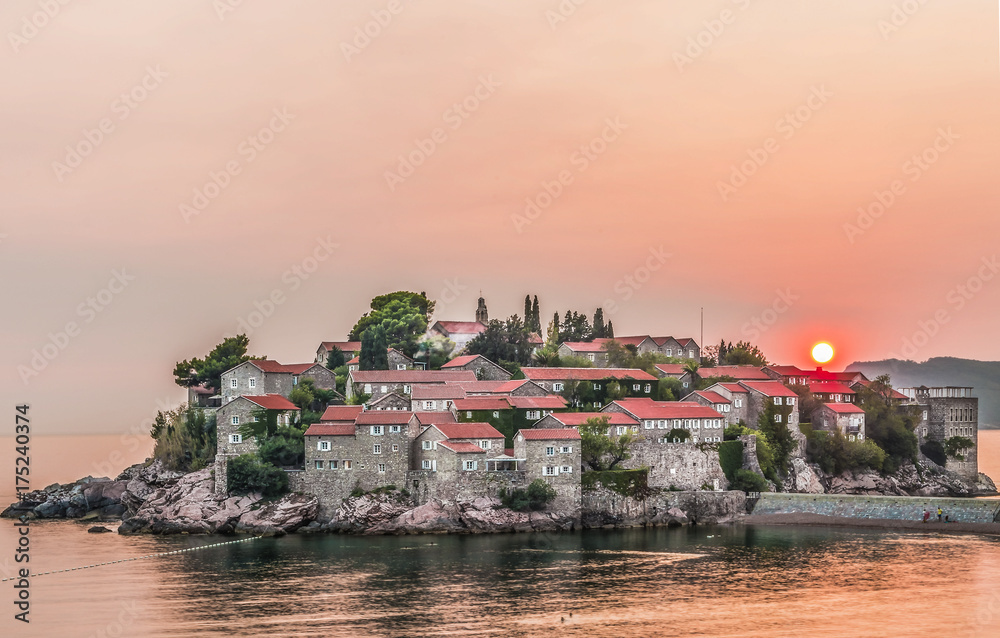 Beautiful view of the island-resort of St. Stephen (Sveti Stefan) on the Budva Riviera, Budva, Montenegro at sunset.