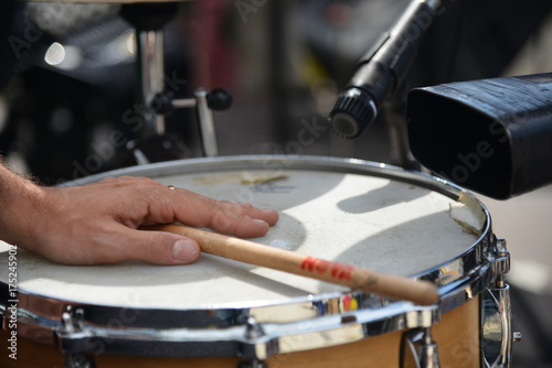 hands playing drum