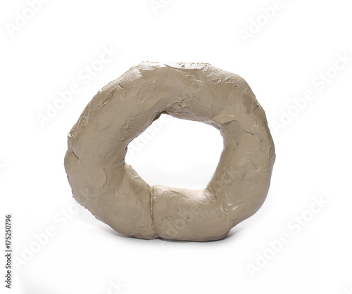 Grey modelling clay circle isolated on white background © dule964