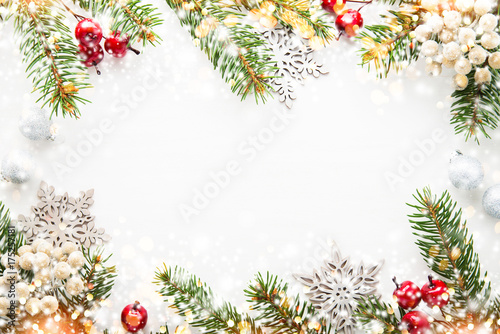 Christmas and New Year holiday background. Xmas greeting card. Glitter bokeh light