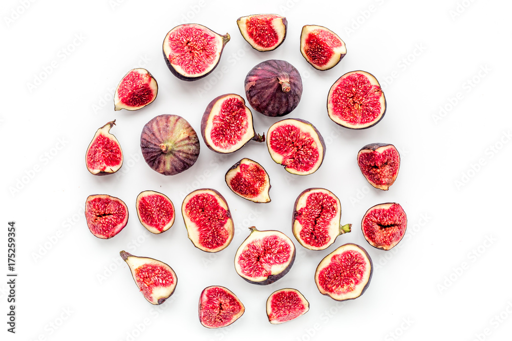 Fresh blue figs slices pattern. Round on white background top view