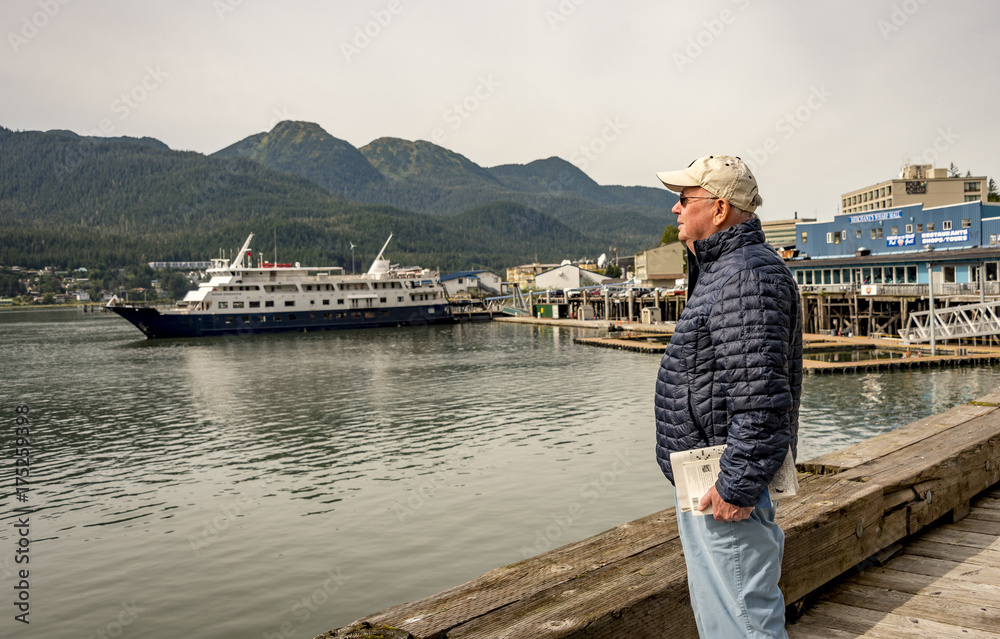 JUNEAU, ALASKA- SEPT 3, 2017: Juneau Pier where it is busy with with sea planes and big cruise ships. Juneau is the capital of Alaska.