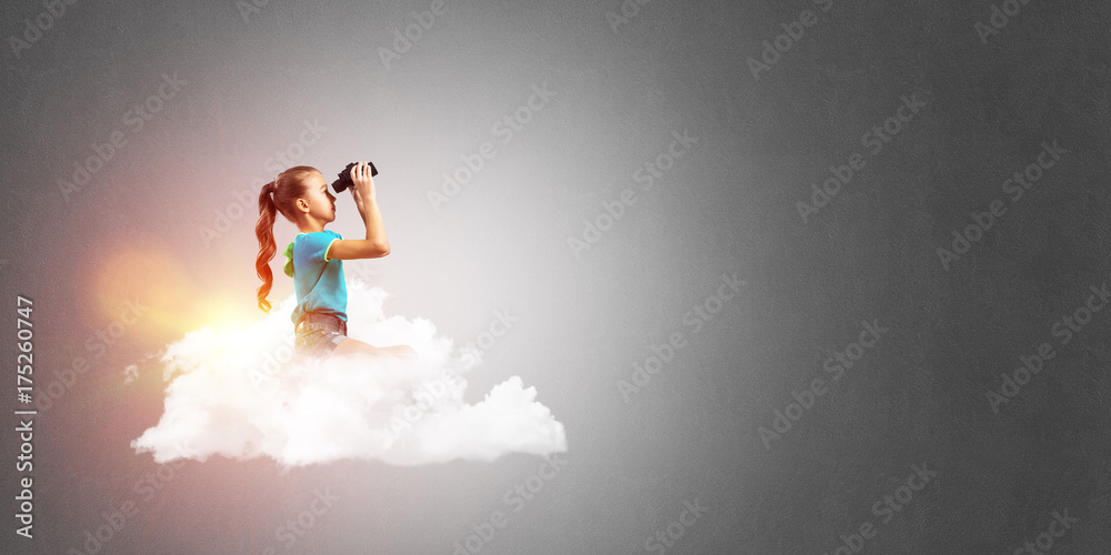 Concept of careless happy childhood with girl dreaming about future Concept of careless happy childhood with girl dreaming about future