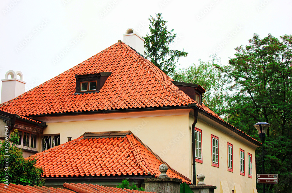 A view of typical Prague house with red tile roof