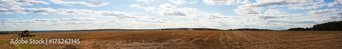 panorama of harvested wheat field in Russia (Moscow region) © antonivano